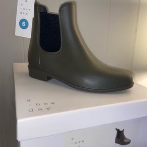 Green rain boots